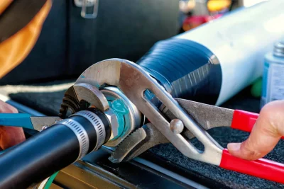 Pipe repair service using professional plumbing tools in Titusville, Florida